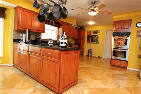 oak cabinets with black steel appliances|update golden oak cabinets.